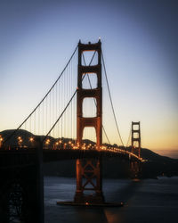 Golden gate bridge against sky during sunset