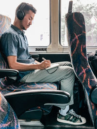 Man sitting in bus