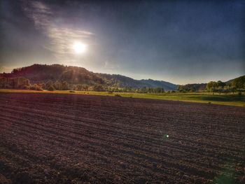Scenic view of field against sky