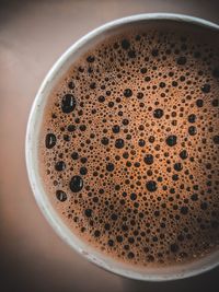 High angle view of coffee cup on table