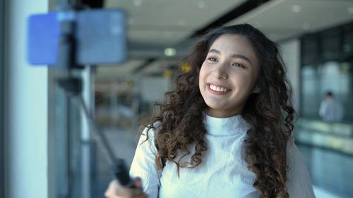 Portrait of a smiling young woman