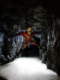 Portrait of miner in cave