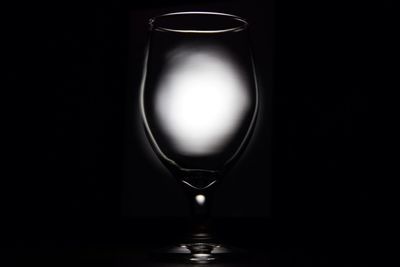 Close-up of lit light bulb
