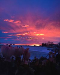 Scenic view of sea against sky at sunset