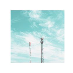 Low angle view of communications tower against sky