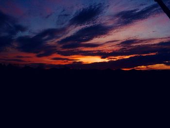 Low angle view of dramatic sky during sunset