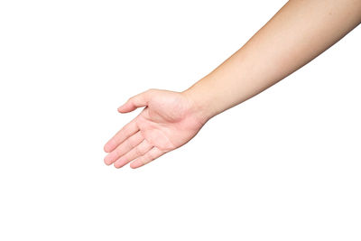 Close-up of hand against white background