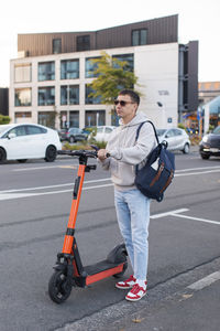 Rear view of man standing on street