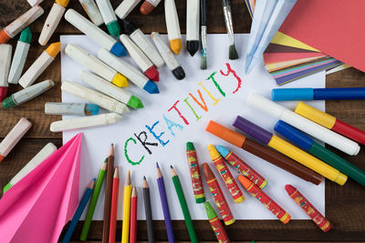 High angle view of various objects on table