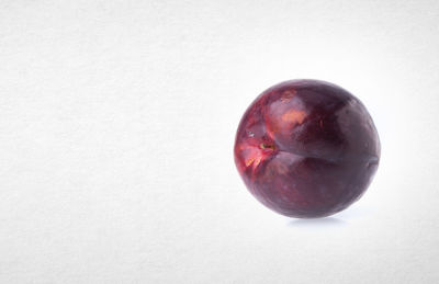 Close-up of apple against white background