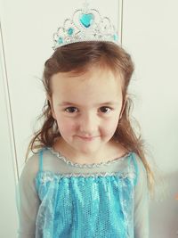Portrait of cute girl wearing tiara 