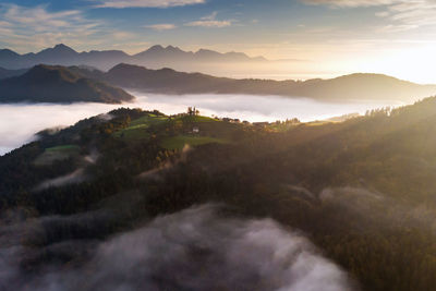 Scenic view of mountains against sky during sunset