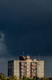 Exterior of buildings in city against sky