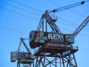 Low angle view of electricity pylon
