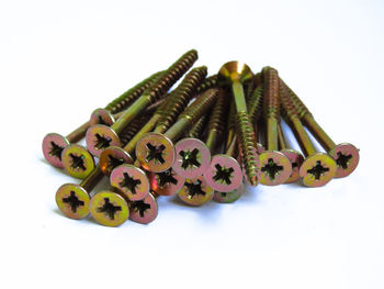 High angle view of candies against white background