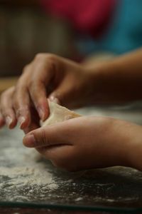 Close-up of person preparing food