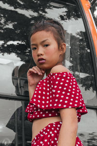 Portrait of girl in car