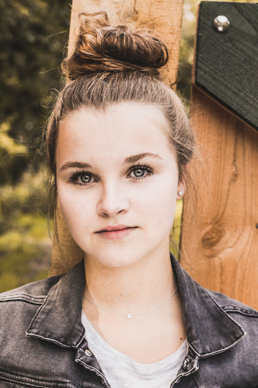 CLOSE-UP PORTRAIT OF YOUNG WOMAN WITH EYES CLOSED