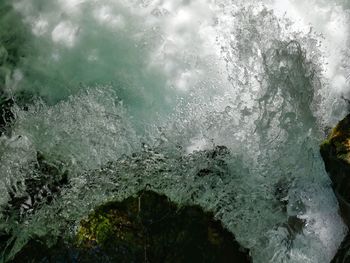 Close-up of sea waves against sky