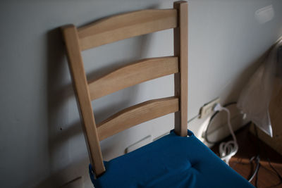 Close-up of empty chair at home