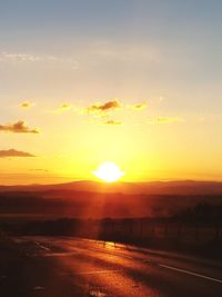Scenic view of sunset over landscape
