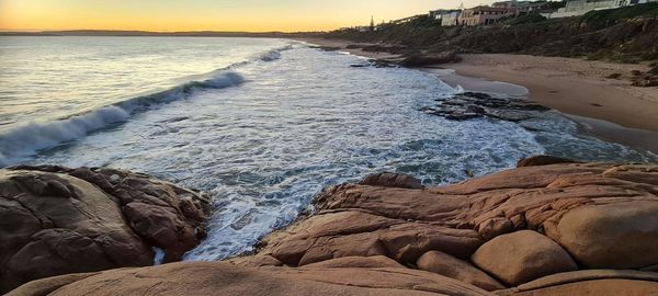 Scenic view of sea against sky during sunset