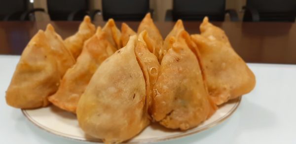 Close-up of serving food in plate