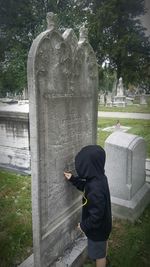 Rear view of a man in water