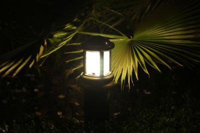 Close-up of illuminated lantern at night