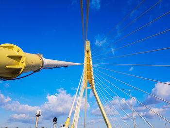 Low angle view of tower against blue sky