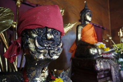 Close-up of small buddha statue