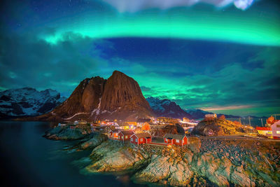 Scenic view of sea against sky at night