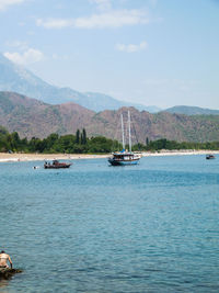 Boats sailing in sea