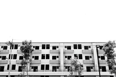 Low angle view of residential building against clear sky