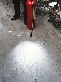 Low section of people standing on road