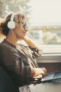 Young woman using mobile phone