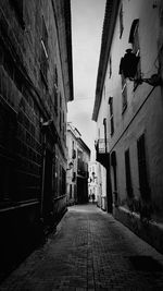 Narrow alley along buildings