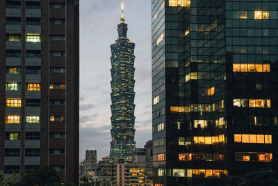 Modern buildings in city at night