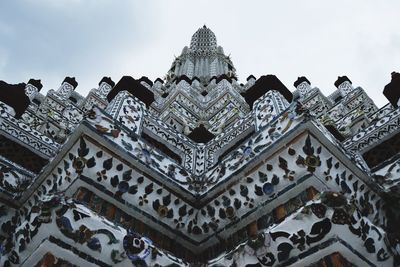 Low angle view of ornate building against sky