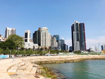 View of skyscrapers against blue sky