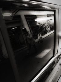 High angle view of man traveling in bus