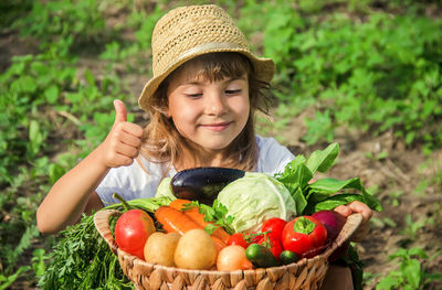 Portrait of cute girl holding food