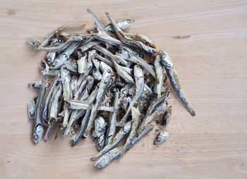 High angle view of bread on wooden table