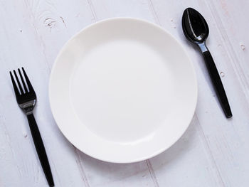 High angle view of empty plate on table