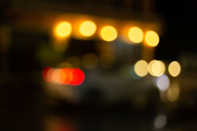 Defocused image of illuminated lights at night