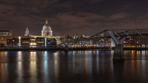 Illuminated buildings in city at night