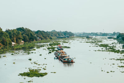 Scenic view of river against clear sky