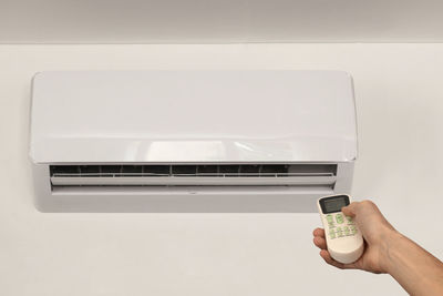 Close-up of person holding mobile phone