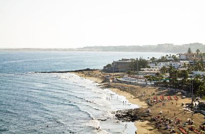 Scenic view of beach against clear sky