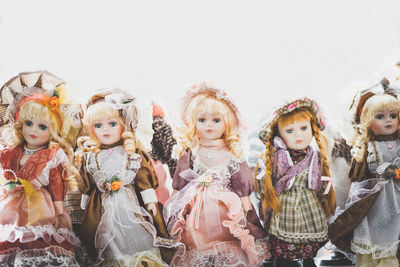Dolls against white background